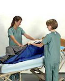 ErgoSafe products help caregivers in safely and comfortably moving patients in home care and institutional settings. ErgoSafe, transfer board, home elevators, Houston, Tomball, Pearland